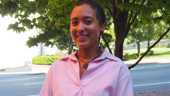 photo of a student outside by a tree