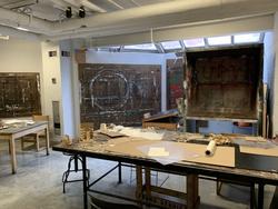 Smaller work room in FYA, showing drawing tables and areas for painting