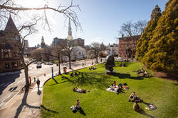 photo of risd beach, a patch of green grass on benefit street near carr haus