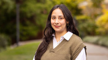 photo of a person smiling with long brown hair
