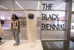A view inside The Black Biennial from front of gallery