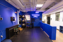 risd fitness area with neon sign