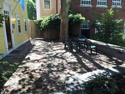 intercultural student engagement patio, brick area with some benches
